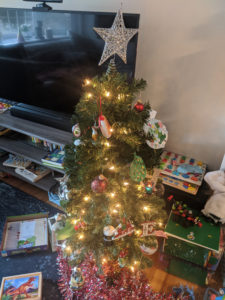 toddler decprating christmas tree
